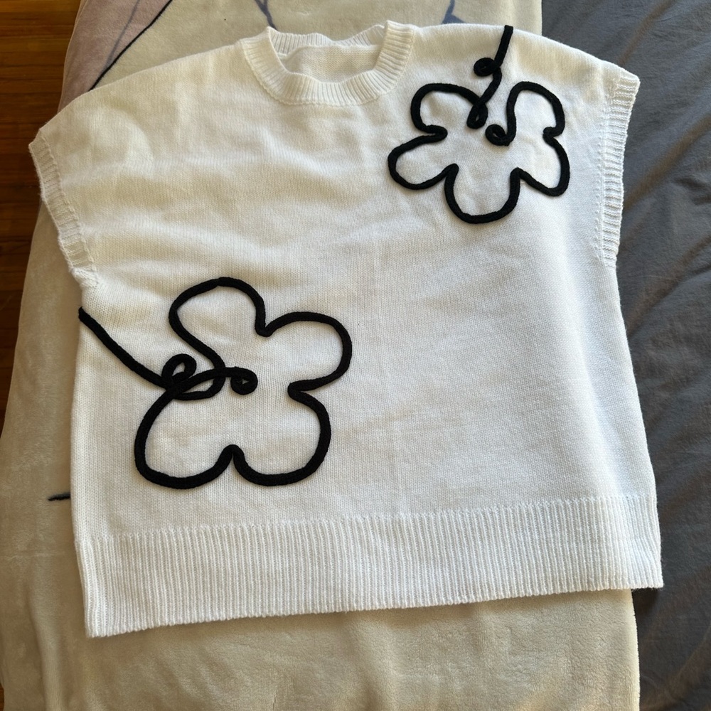 White Sweater with Black Floral Design